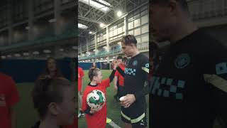 Special Olympics GB Principal Ambassador Jack Grealish hosts athletes at the Etihad Campus