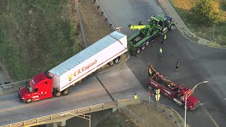 Crews work to clear semi-trailer that got stuck on bridge over I-40 in Del City