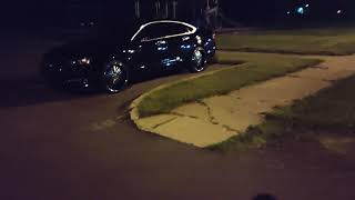 Massive Tsunami 924  on wheels rims 22" on Chevy Impala at night