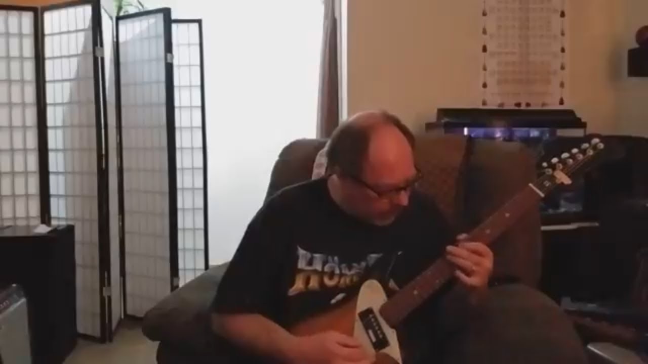 Victoria single pickup guitar with Victoria Suitcase amp