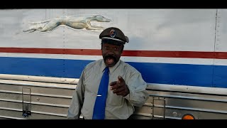 Jerome Green's Magic Bus Ex- Greyhound MC-9 arrives at 2022 National Night Out, Spokane Valley Mall.