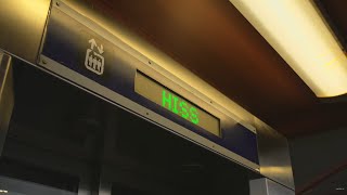 Sweden, Stockholm, Upplands väsby train station underpass, 2X elevator