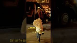 Chrissy Teigen was spotted carrying her towel while arriving back at her hotel #shorts #towels