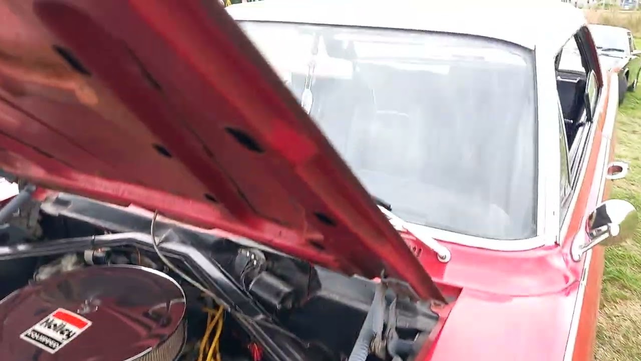 V8 Red classic car. Crome bits.