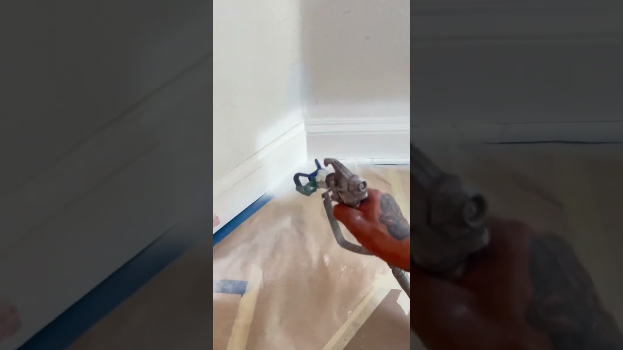 Spraying Baseboards With Emerald