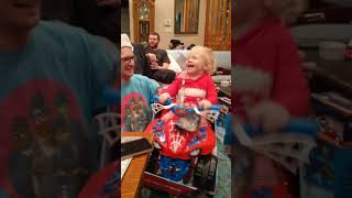 Guy plays with son on new toy ATV and boy falls off