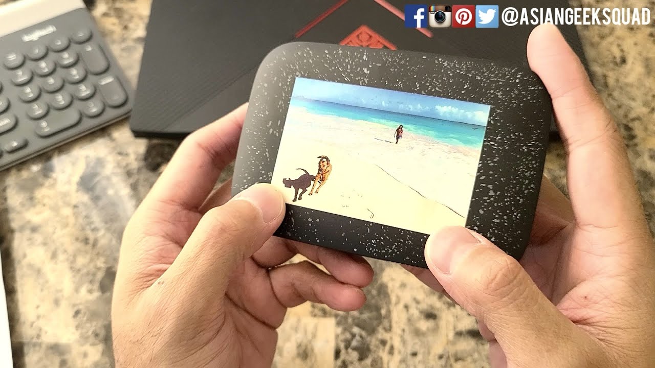Replacing the Photo Printer Paper on 