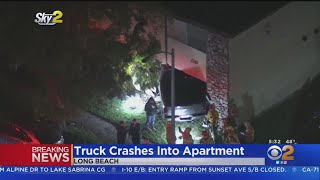 Child Critically Hurt After Truck Slams Through Wall Of Long Beach Apartment Building