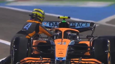 LANDO NORRIS push his car into the Pit land after stopping on track | Bahrain Pre-season Test 2022