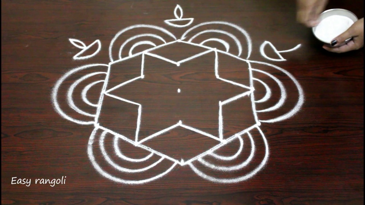 rangoli art designs for diwali with 5 to 3 interlaced dots- simple ...