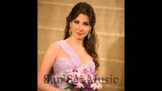 Download Lagu مستنياك - نانسي عجرم - نغمة 2014 MP3