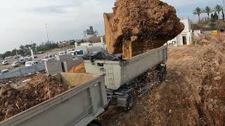 : Title: "Hitachi 350 Excavator Loading Dirt into a Truck Like a Pro!"