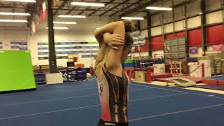 Backward roll down incline with shoulders crossed technic