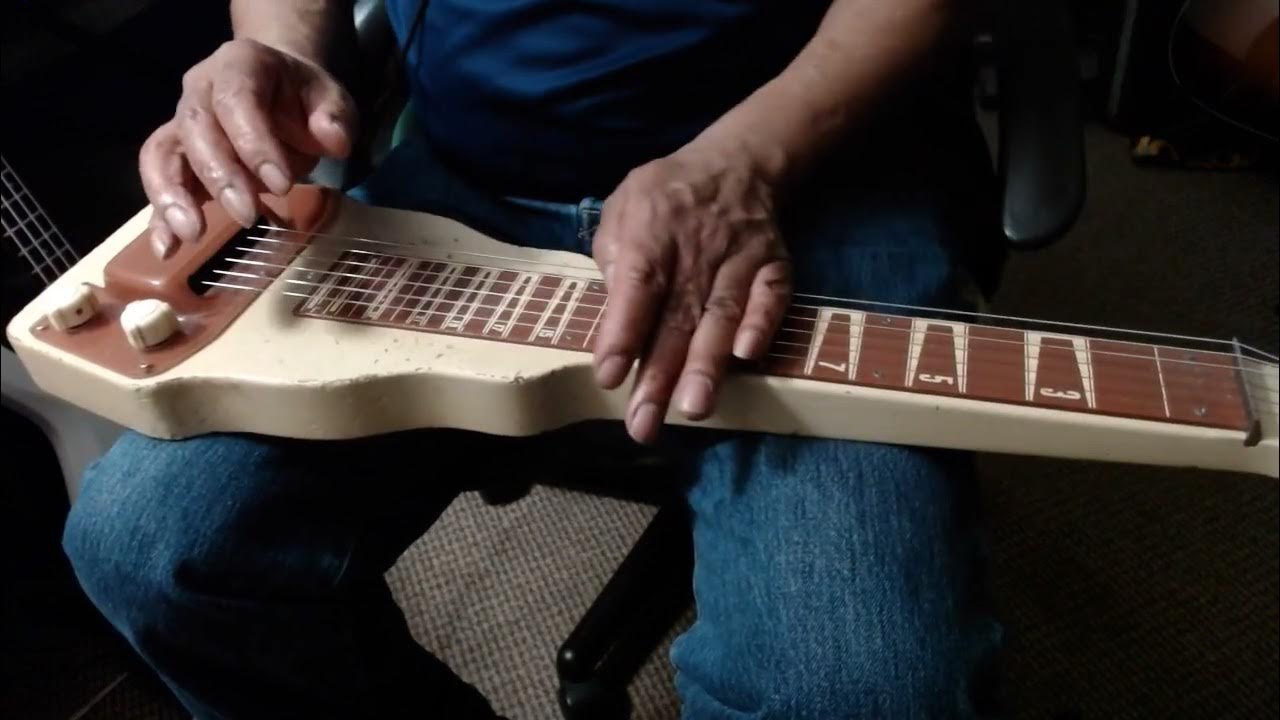 It's a Lap Steel Guitar YouTube