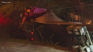 Lanes reopen as crews work to clear overturned tractor-trailer on I-20 EB near MLK Jr. Drive