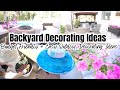 Summer  backyard refresh  summer ready  patio makeover with potted flowers and patio decluttering
