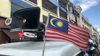Malaysia: Loudspeakers on trucks spread awareness on virus | AFP