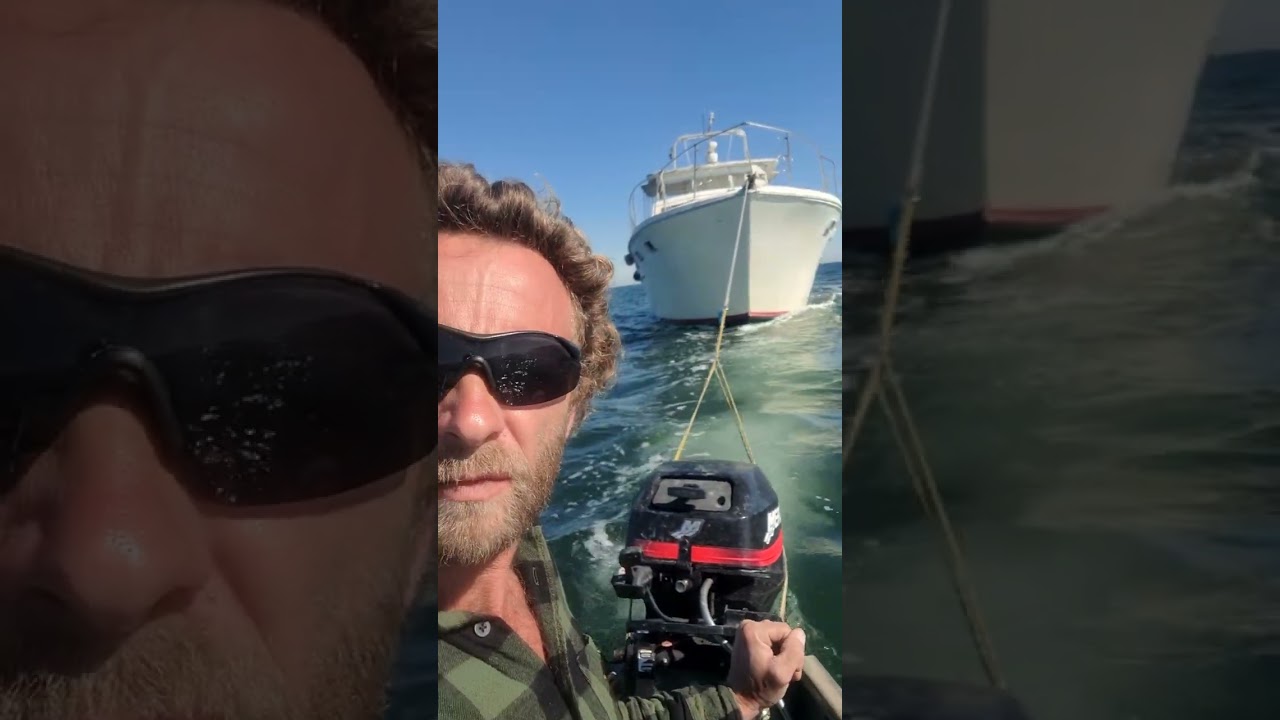 towing big boat with little boat