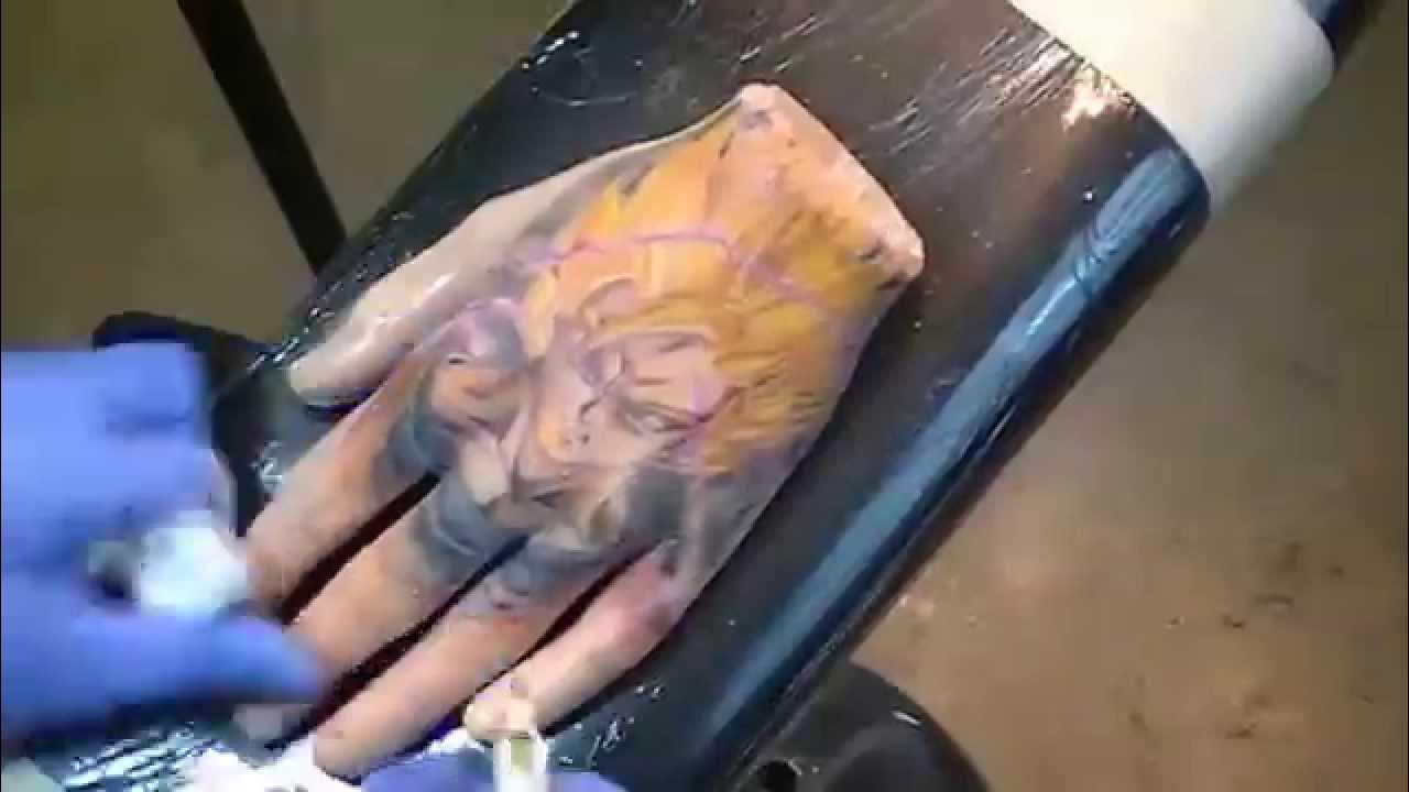 Super Saiyan Goku hand Tattoo - YouTube