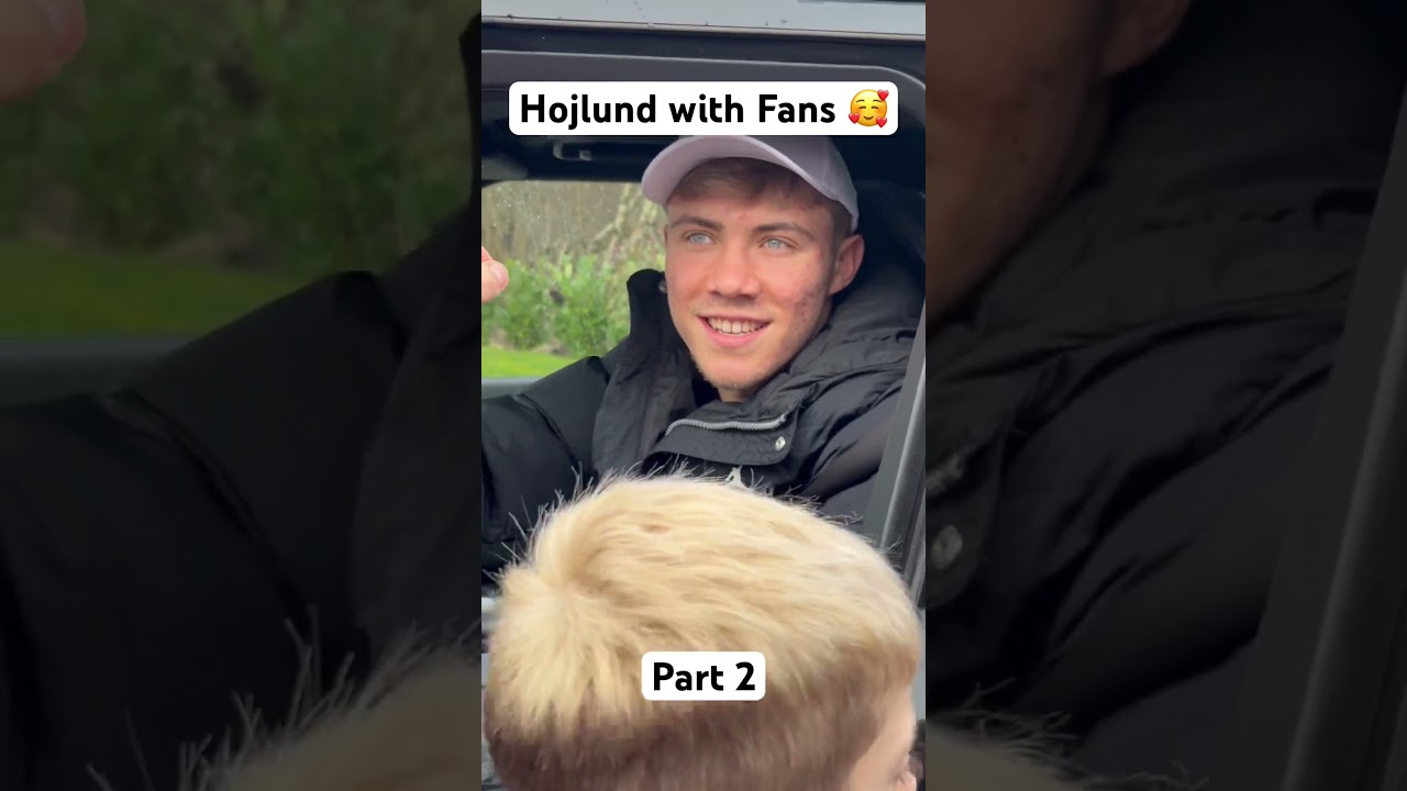 Rasmus Højlund with fans taking photos and autographs 