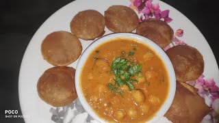 Ruchik Chhole Bhature With Tasty Puri In Goan Style In Konkani Language.