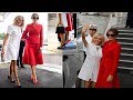 Melania dons demure red Dior skirt suit as Brigitte Trogneux opts for white LV minidress in Paris