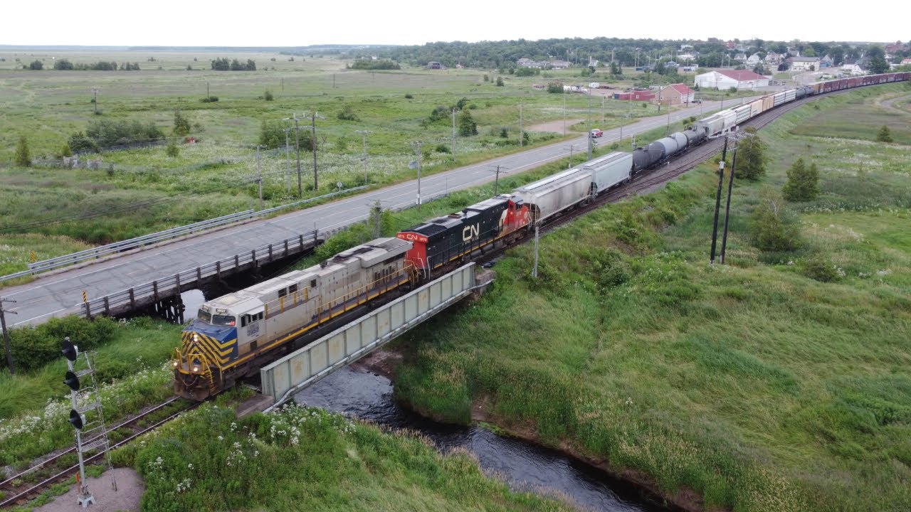 Aerial Aerial 4K Views! VIA Rail Ocean Train 15 and Freight Train CN