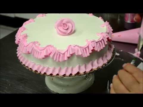 Chef Making a Pink Birthday Cake in Bakery