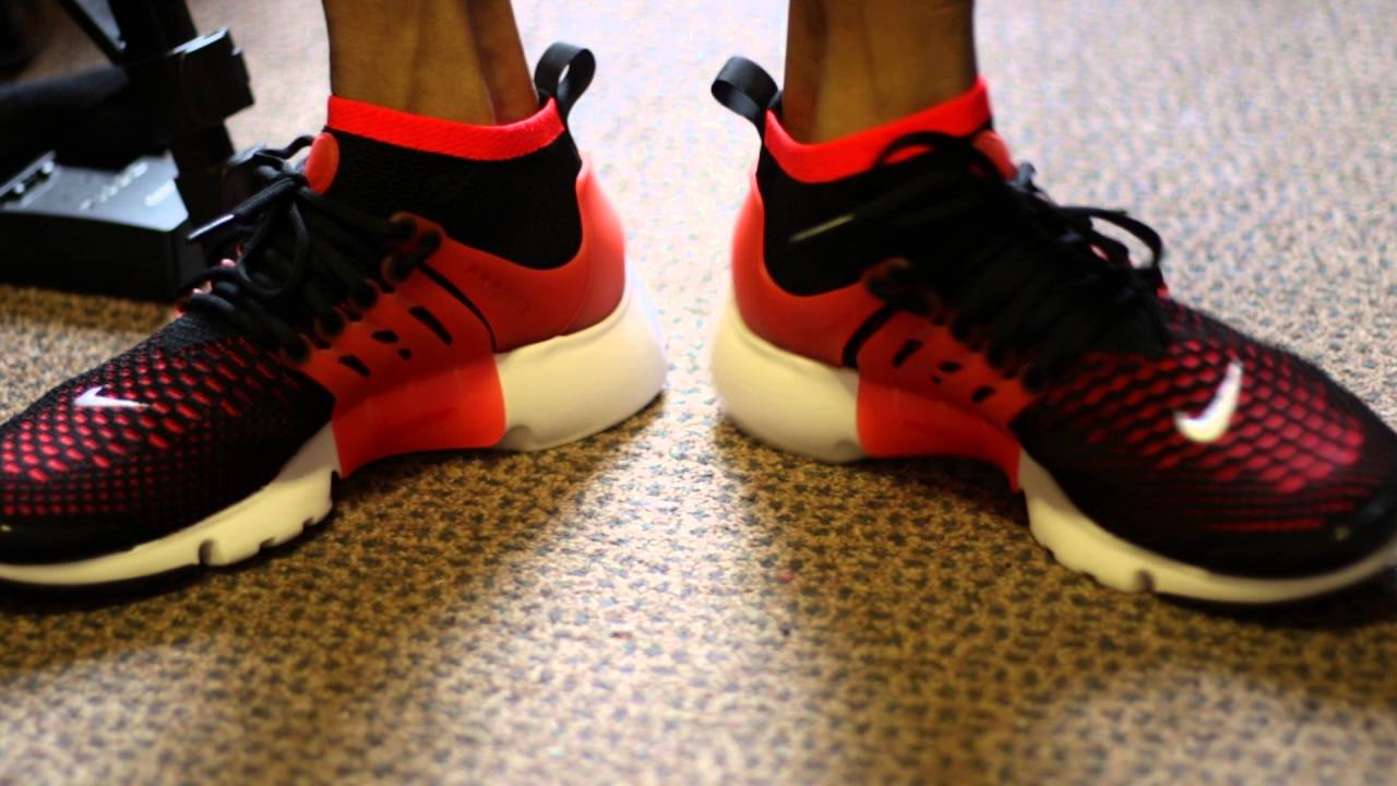 red nike presto flyknit on feet