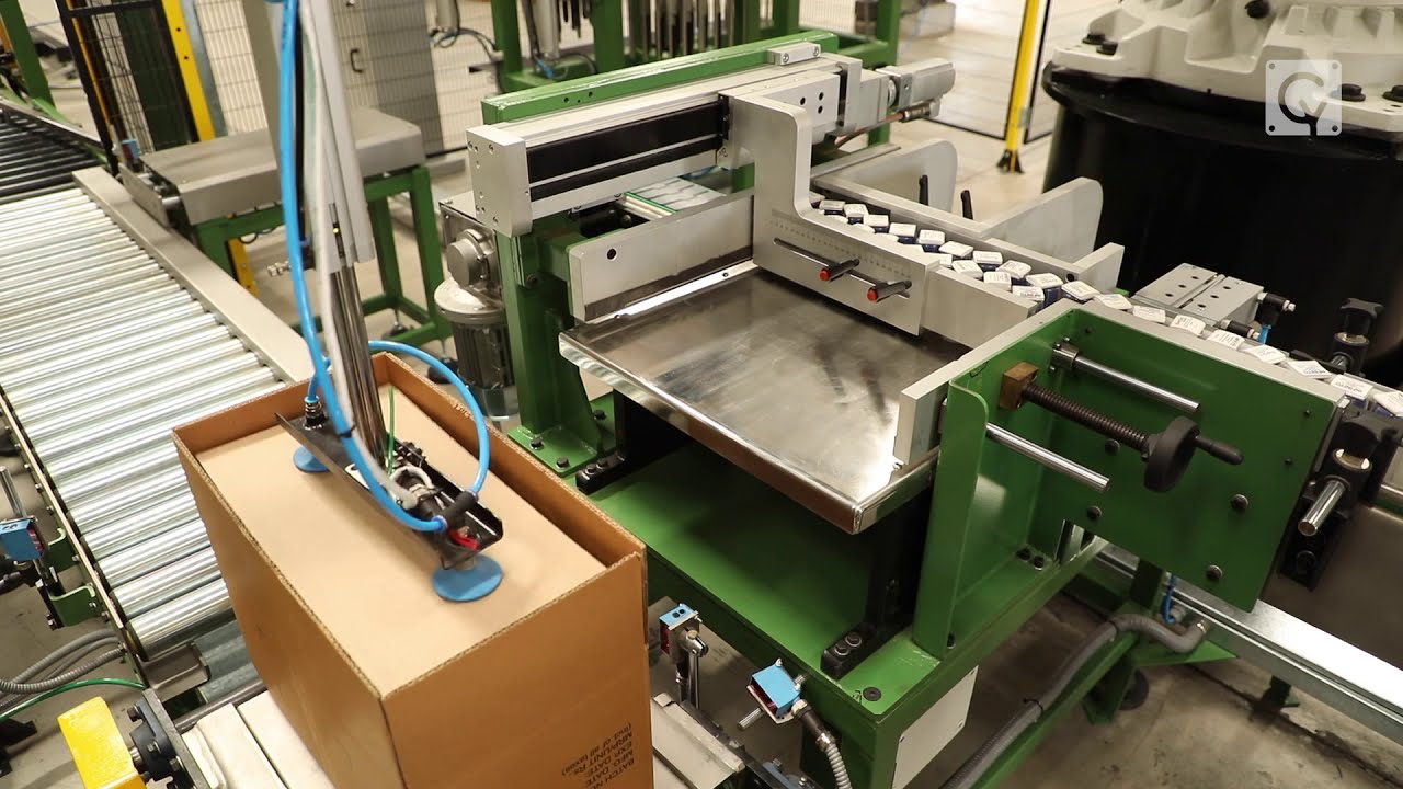 Integrated Secondary And Tertiary Bottle Packing System | Cybernetik Robotic Automation