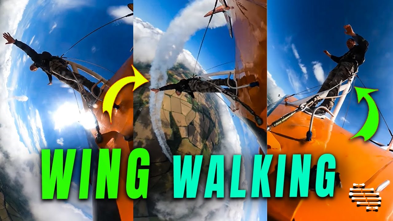 Wing Walking Loops and Rolls Through the Majestic Clouds - YouTube