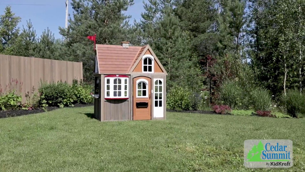 wooden playhouse with assembly