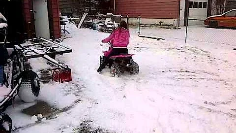 madison and tonya on maddys 4 wheeler