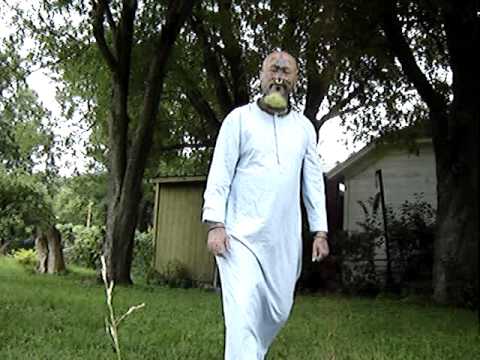 Me walking around yard in  Light Blue Kaftan Dishdasha
