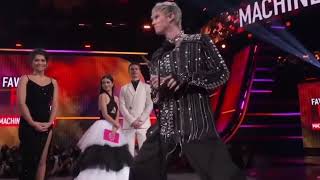 when Machine Gun Kelly is too tall for mic stands at awards show