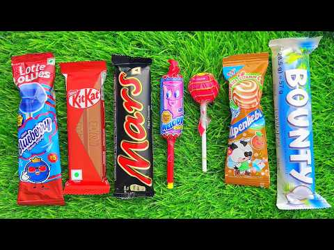 Satisfying video Asmr lollipops candy and chocolate gummy candy unboxing video Asmr.