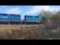 A lumber train off the 430 in big river nb nice blue locos