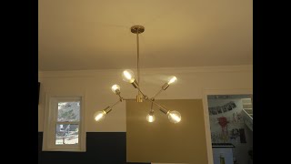 This Sputnik Chandelier Makes A Fun Funky Center Piece