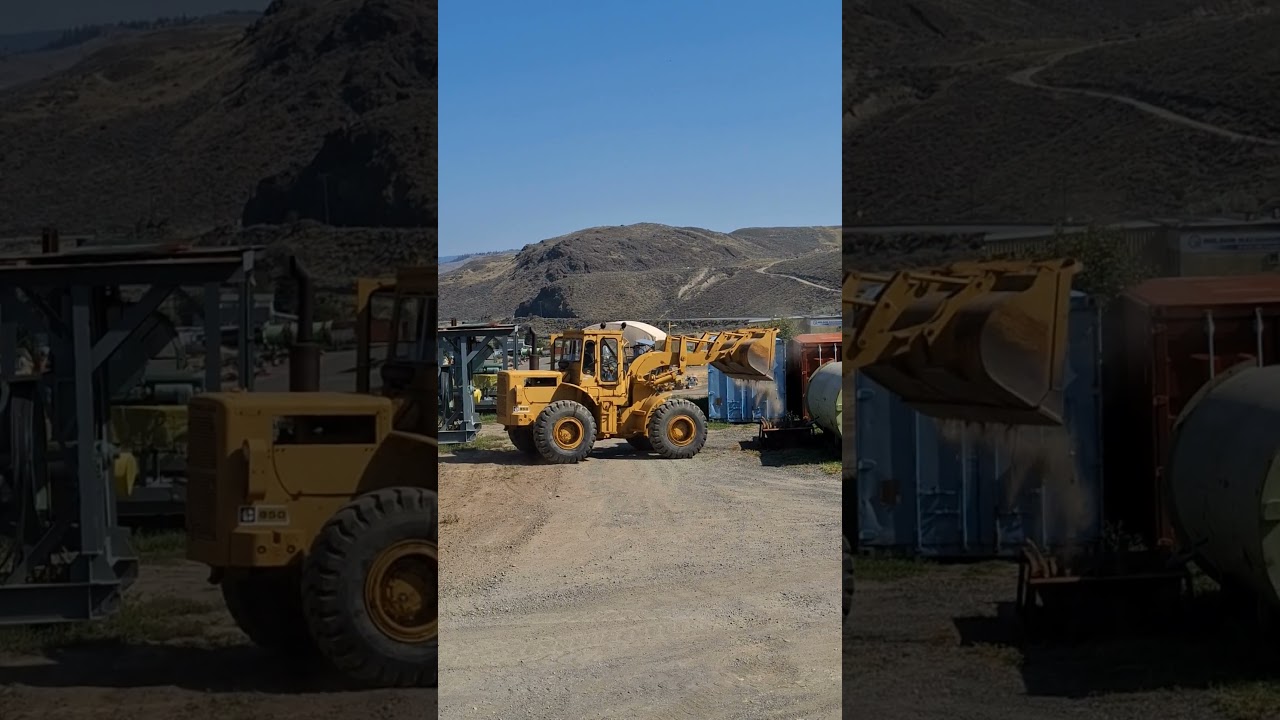 CAT Loader Working in the Yard  