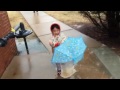 2 yo enjoys the rain 2歳児傘を振り回す
