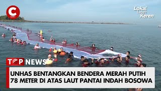 UNHAS BENTANGKAN BENDERA MERAH PUTIH 78 METER DI ATAS LAUT PANTAI INDAH BOSOWA