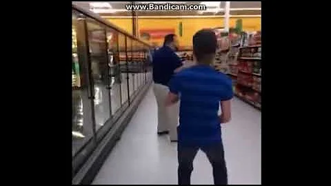 Following a fat guy around a supermarket with a saxophone