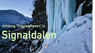 Climbing ice in Signaldalen Soppingfossen under Northern lights
