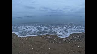 Calm Waves on a Cloudy Day | Nature.Raw