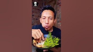 Makan daun singkong rebus