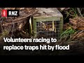 Volunteers racing to replace traps hit by flood