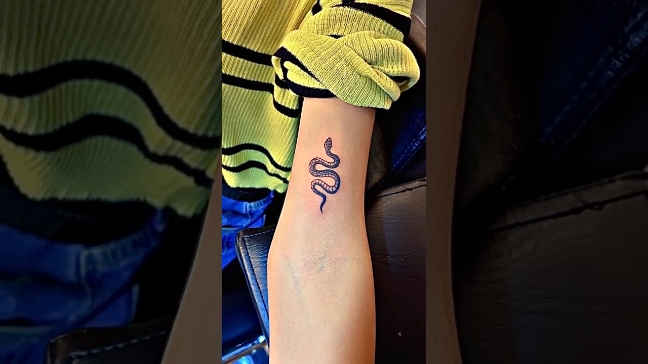Cute snake tattoo design 