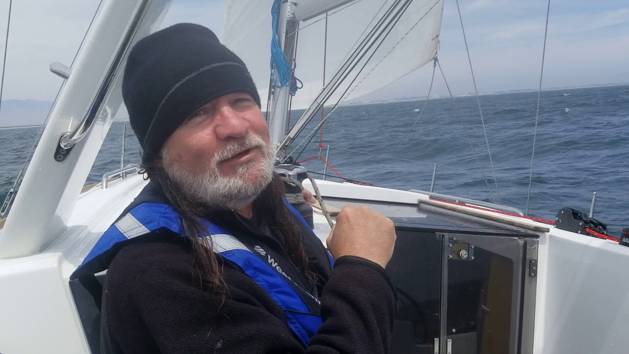 Sailing a Beneteau 38.1 in windy conditions.