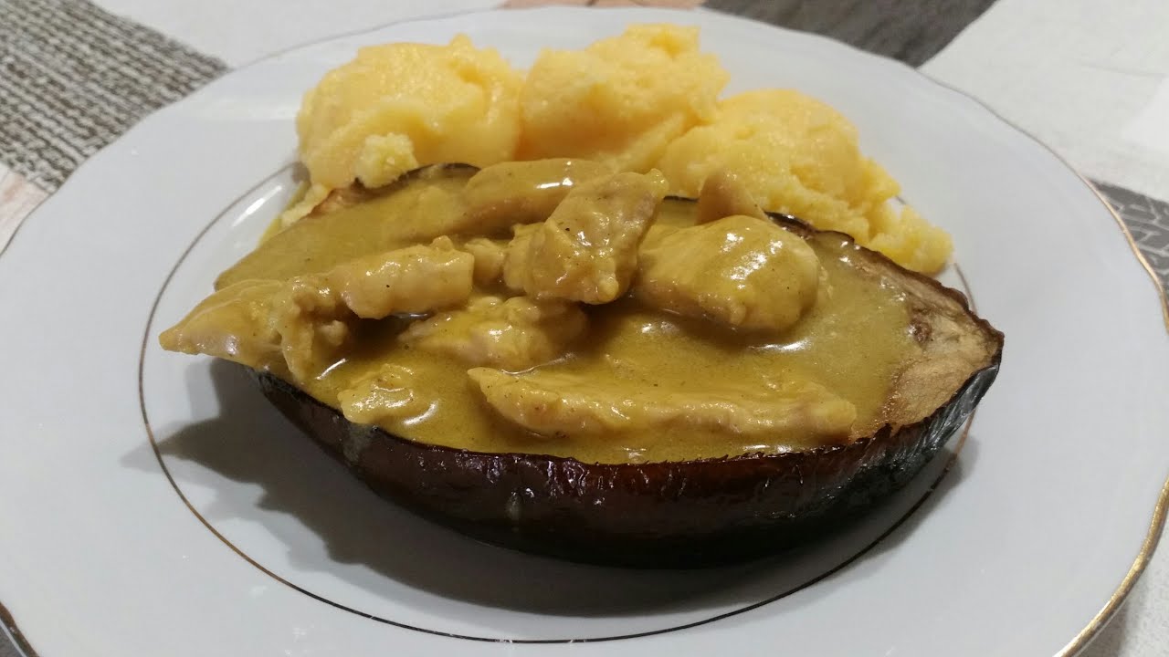 POLLO AL CURRY IN BARCHETTA DI MELANZANA CON CONTORNO DI POLENTA