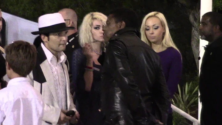 Corey Feldman channels Michael Jackson as he arriv...
